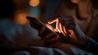 © zhikun sun - Close-up of hands interacting with smartphone screen at night