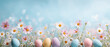 © vStock - Pastel easter eggs and spring daisies border on blue sky background