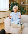 © Lumos sp - Portrait of a senior mature or mid aged woman doctor psychiatrist during session with her patient in her office in clinic