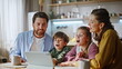 © stockbusters - Happy relatives enjoying video call using tablet webcam modern kitchen closeup