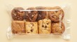 © vxnaghiyev - Assorted bakery treats inside a plastic sealed cookie pack