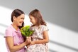 © BillionPhotos.com - Happy child hold flowers. Mothers day
