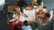 © InfiniteFlow - Top down aerial view of professional business people hands making scrum task board to manage workflow in workplace. Diverse marketing team writing and working together at meeting room. Convocation.