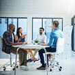 © peopleimages.com - Review, conversation and man with business people in meeting for planning, discussion and training. Project management, collaboration and employee team for feedback, research and report communication