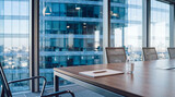 Professional photograph of a modern office conference room with city views through large windows.