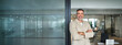 © insta_photos - Portrait of confident happy rich middle aged business man investor, older team leader, mature professional company executive wearing suit standing arms crossed looking away in office, copy space.