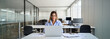 © insta_photos - Happy smiling mature middle aged professional business woman investor manager executive or attorney looking at laptop at workplace working on computer in office.