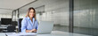 © insta_photos - Happy smiling mature middle aged professional business woman bank worker or hr manager, corporate executive or lawyer attorney looking at camera at work working on laptop computer in office, portrait.