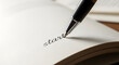 © KrakeN - New Beginnings: Pen Writes 'Start' on Blank Page