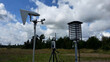 © Володимир Кучмійов - Modern Weather Station with Sensors and Monitoring Equipment in Field under Cloudy Sky, Meteorology Technology Measuring Climate and Atmospheric Data