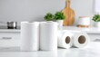 © Karepmu - White paper towels sit on a marble counter in a bright kitchen; cutting board and plants in the background