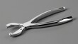 © SHI - shortcoming. A stainless steel dental facebow isolated on a neutral background. STEM education sheets, lab safety posters, designed for biotech research communications, used by nutritionists.