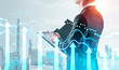 © ImageFlow - Business person reviewing financial data with glowing arrows in modern graphic style on city background, symbolizing rise and future market concept