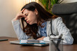 © Nenad - Burnout, stress or doctor woman on laptop with headache from depression, mental health or anxiety medical review. Tired, pain or sad nurse frustrated, angry or depressed for medicine report in office
