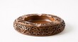 © evisuals - Intricately carved wooden ashtray with floral patterns on a plain white background realistic texture