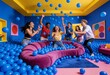 © TimosBlickfang - Diverse young adults having fun in blue ball pit