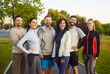 © Studio Romantic - Group portrait of a happy people during outdoor fitness training, boosting sport workout, uniting in team effort, enhancing physical activity, enjoying vibrant exercise in an open setting.