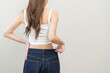 © KMPZZZ - Shape slender, thin waist, slim fit asian young woman, showing body shape her weight loss, happy wearing in big, large or oversize jeans, excess lose by diet and exercise. Healthy lifestyle concept