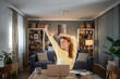 © Migma_Agency - Happy woman stretching arms working from home
