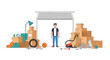 © Mimi - A man stands in front of an open garage door, surrounded by an extensive collection of moving boxes, household items, and various tools.