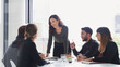 © peopleimages.com - Business people, meeting and presentation with woman in office for training, discussion and workshop. Education, project management and upskill development with corporate staff team and communication