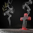 © Flatart - Ash Wednesday concept photo with burning cross and smoke