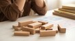 © ALAUDDIN - Scattered Wooden Blocks on Office Desk for Business Failure Risk and Strategy Planning Concept Photo