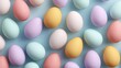 © Naeem - Pastel Easter eggs collection in soft pink, blue, yellow, and green, solid color background, flat lay, springtime festive decor