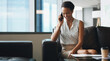 © peopleimages.com - Phone call, business and woman on couch in workplace for opportunity, compliance feedback or chat. Mobile, listen or happy consultant in company lounge for policy review, regulatory update or talking