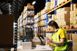 © DC Studio - Warehouse clerk chatting on video call with a client on help line, fixing shipment details for cargo goods before delivery. Employee and customer on remote videoconference network.