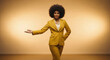 © Tamaras Pictures 4U - Confident black woman in yellow suit presenting with outstretched arm