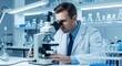 © DesignAIPro - A male scientist in a lab coat intently observes a sample through a microscope.