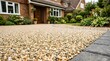 © Immersive Dimension - Newly Installed Permeable Resin Driveway Surface For Sustainable Drainage And Eco-Friendly Landscaping
