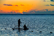 © Rechitan Sorin - Tourists enjoying the sunset beach on Mauritius Island, Africa