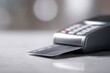 © nanskyblack - Close up of a credit card being inserted into a sleek card reader, retail concept