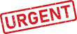 © NasimaH - Prominent red distressed rubber stamp with the word URGENT against a stark white backdrop