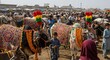 © Naiki - Decorated Cattle Market Scene with People and Festive Atmosphere.