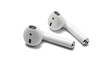 © Robert - two white wireless earbuds lying on a black surface, captured in a clean studio shot emphasizing their design and technology.