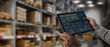 © onephoto - Logistics manager analyzing supply chain data dashboard on tablet inside warehouse storage facility. Concept of logistics analytics, inventory monitoring, digital warehouse management and technology d