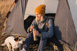 © Tatyana Gladskih - Middle aged woman in tent at campsite