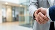 © The Usable Stock - Macro Close-Up of Professional Business Handshake with Expansive Copy Space in Modern Office