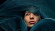 © Lustre Art Group  - Cinematic beauty portrait of Asian woman emerging through flowing teal silk fabric, luxury fashion and cosmetics concept for advertising campaigns, beauty branding and editorial design.