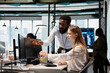 © DC Studio - Lead programmer providing support to new worker using PC in software development agency. African american IT expert helping trainee coding during internship in tech startup