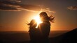 © Aleksey - Beautiful Silhouette of a Mother Holding Her Child Against a Dramatic Golden Sunset