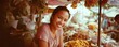 © Agung - Smiling Female Street Food Vendor Selling Fruits.