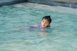 © geargodz - preschool child girl playing and swimming in pool