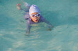 © geargodz - preschool child girl playing and swimming in pool
