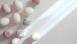 © Andreas - Minimalist Easter holiday background with pastel colored Easter eggs arranged on soft light background, gentle morning sunlight, soft shadows, elegant minimal composition, modern seasonal marketing