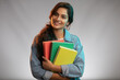 © Jawarla - Happy Indian Female College Student Holding Books Isolated on White Background, Smiling University Student Portrait, Education Concept, Photorealistic