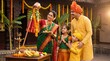 © PRASANNAPIX - happy indian family celebrating gudhi padawa festival together at home